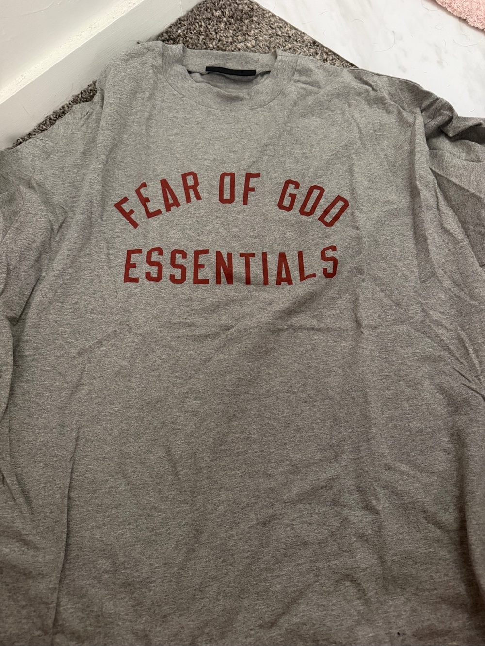 Fear of God Essentials Long Sleeve Tee in Heather Grey with Red Logo
